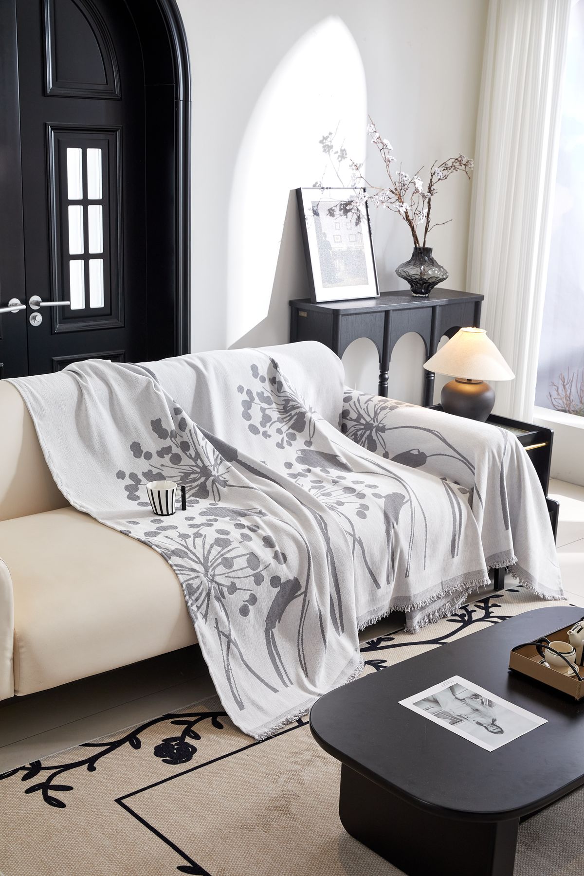 Lin washed linen throw draped over a neutral sofa