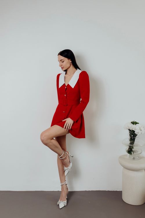 A woman in a red dress and white shoes  Free Stock Photo