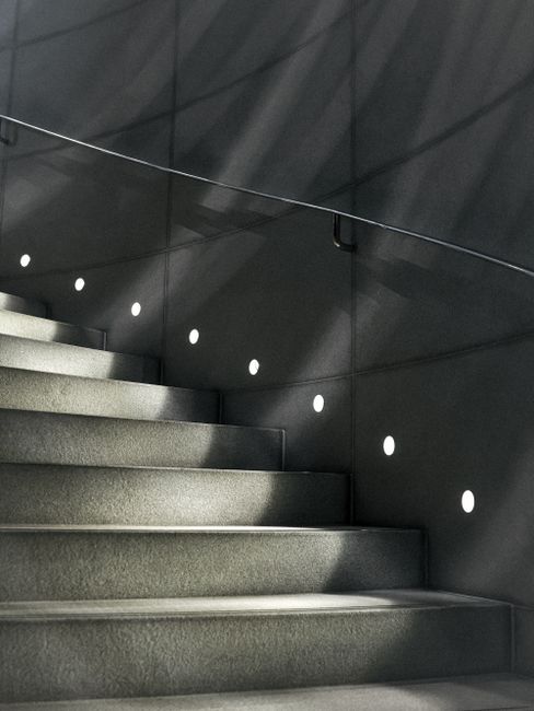 Sleek modern staircase with lights in Bangkok, Thailand's urban architecture.