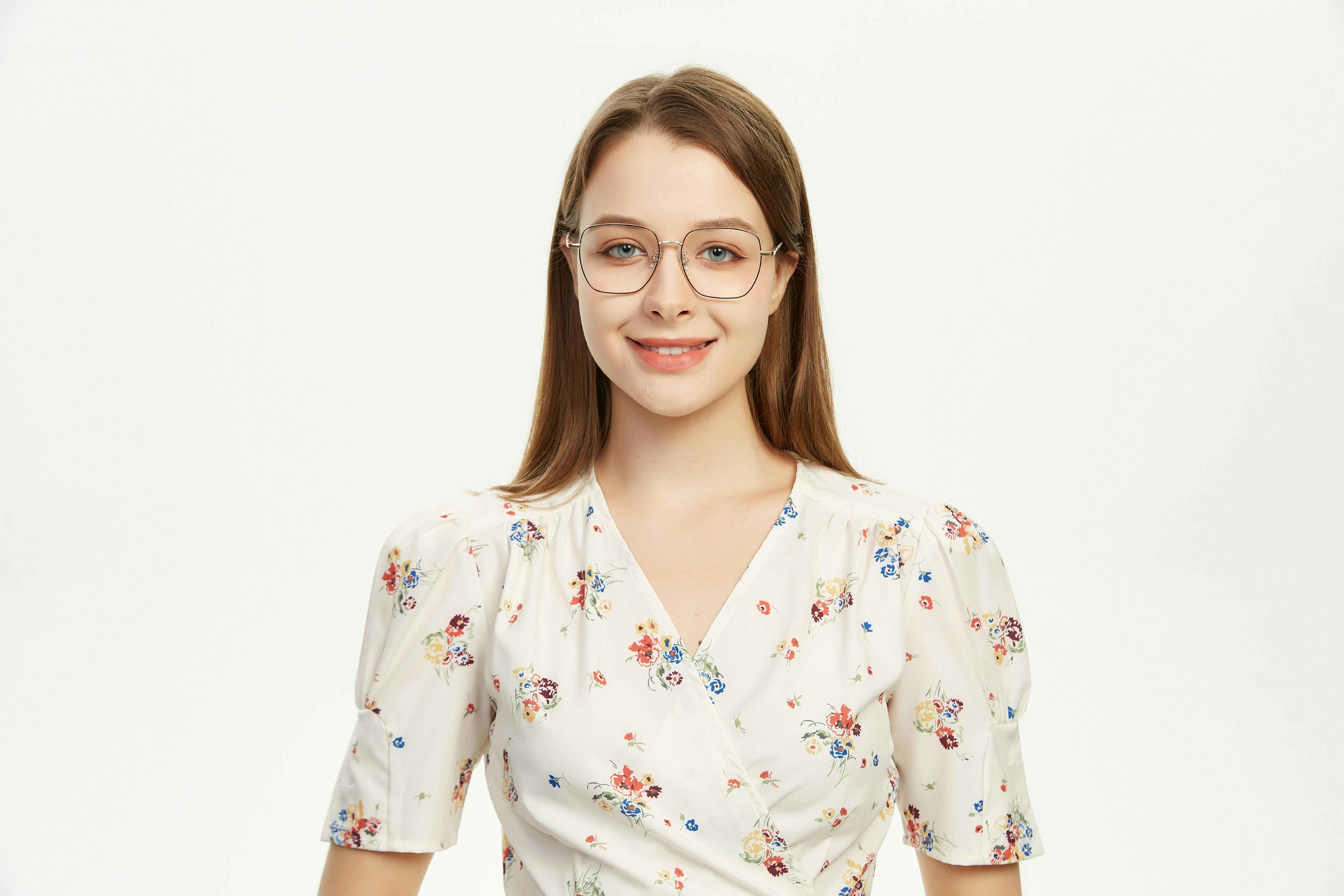 round glasses complement floral dress