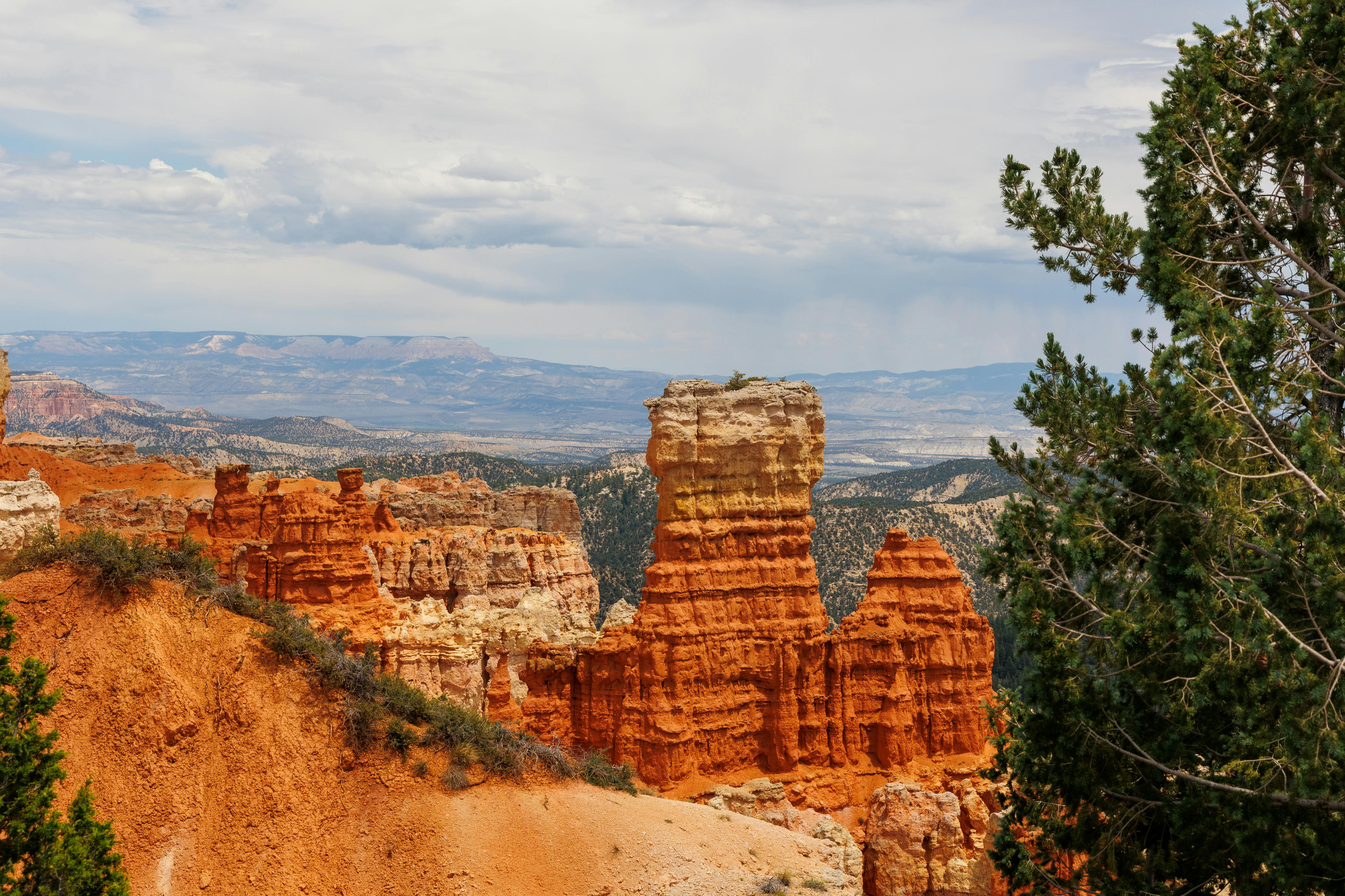 Explore the stunning red rock formations of Bryce Canyon National Park.