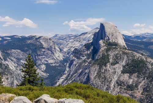 Free Majestic Half Dome in Yosemite National Park showcases nature's grandeur under a clear blue sky. Stock Photo