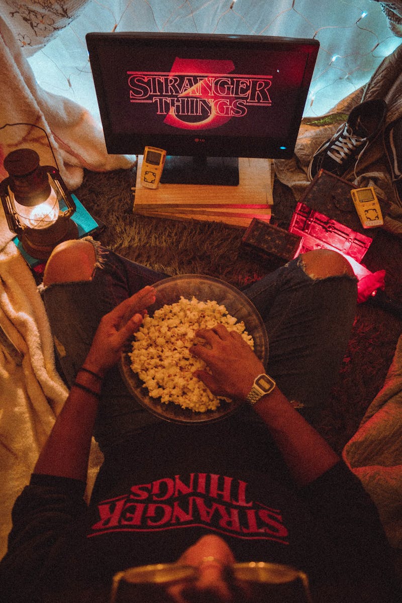 Man Eating Popcorn