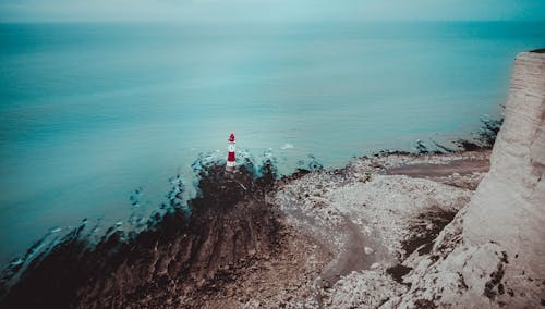 Free Lighthouse Near Body of Water Stock Photo