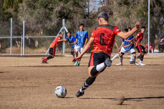 A thrilling soccer match with players in action, showcasing teamwork and athletic skill.