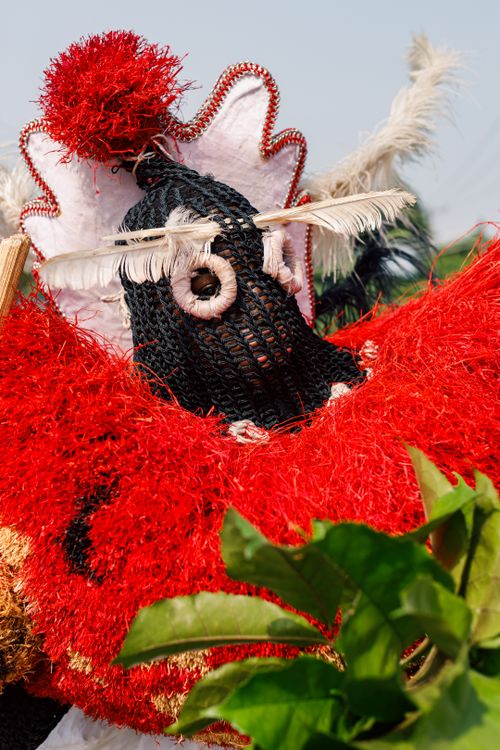 Free Close-up of a vibrant traditional Nigerian masquerade during a festival. Stock Photo