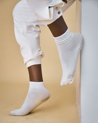 Ribbed cotton crew socks, photo by Jesutobiloba Precious on Pexels
