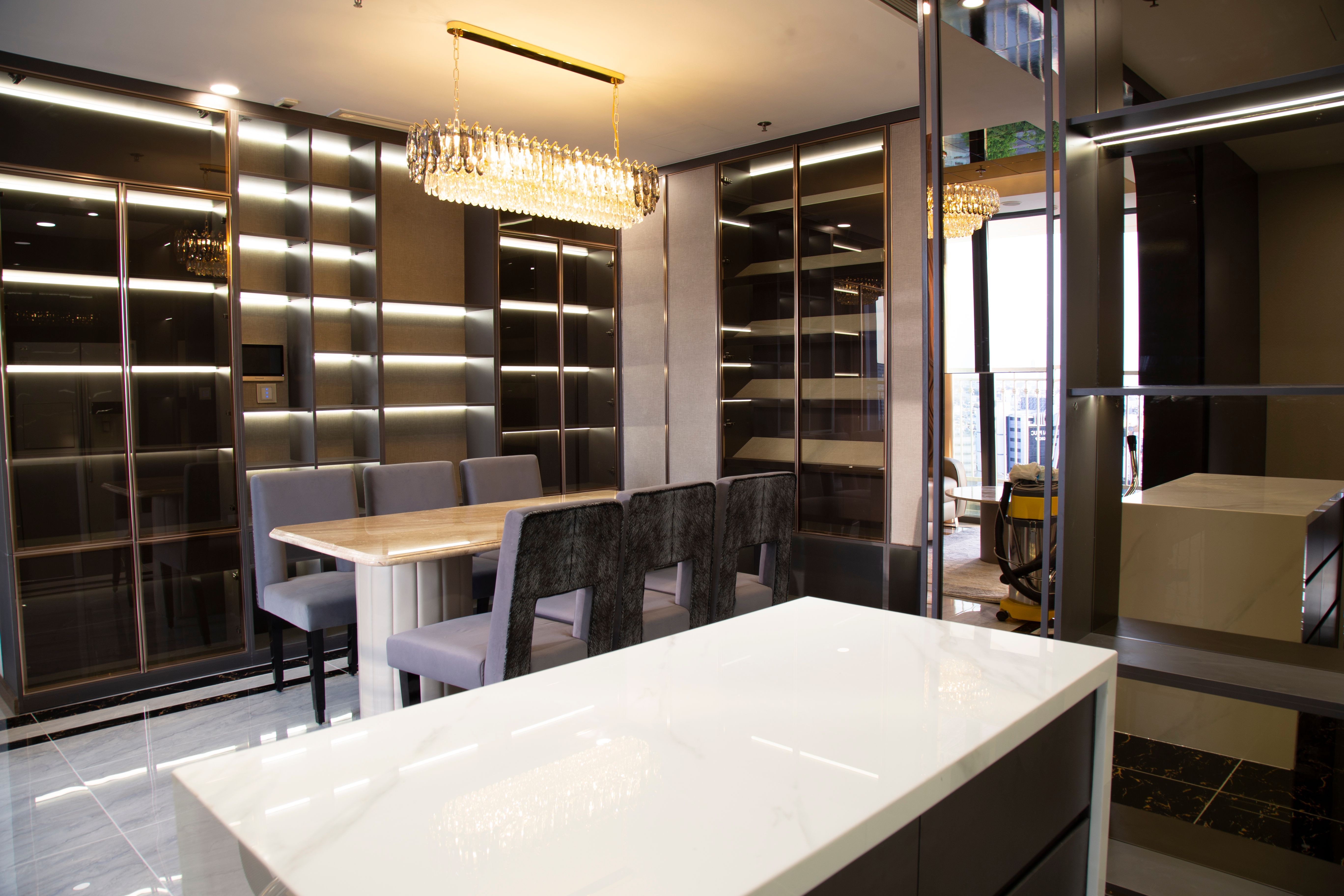 high back arm dining chairs in elegant modern dining room