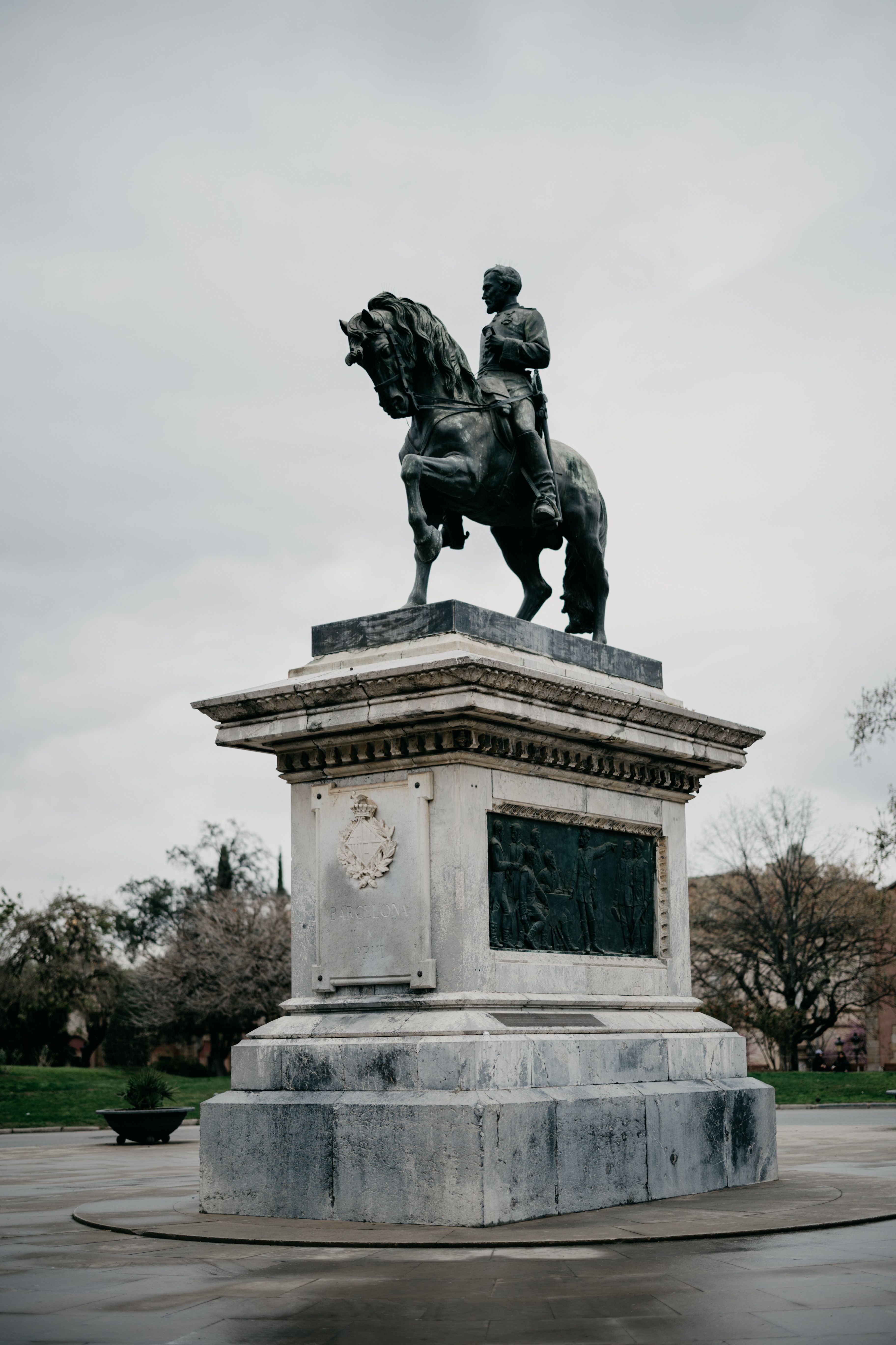 A statue of a man on a horse in a park · Free Stock Photo