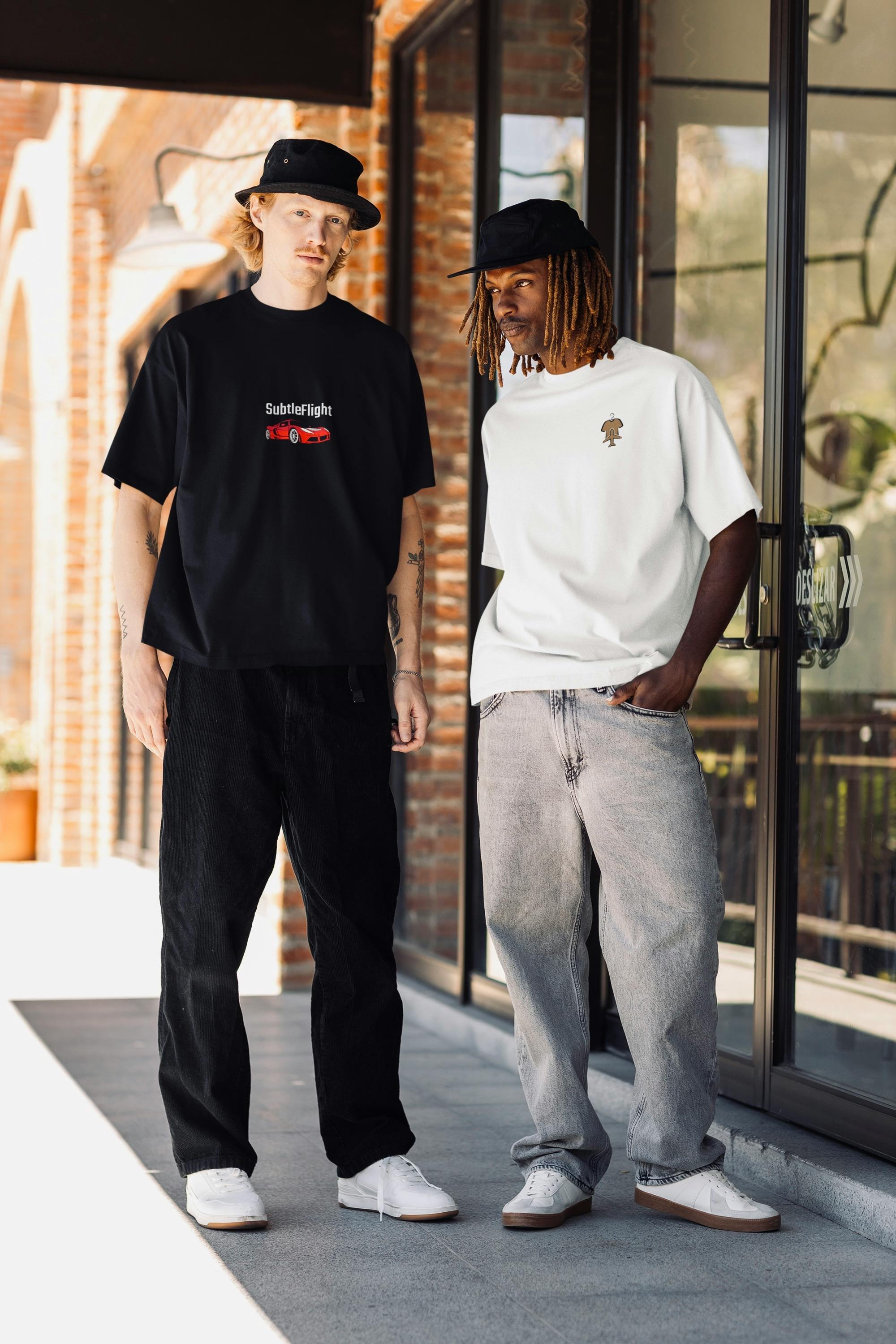 two men standing outside a building wearing hats and shirts