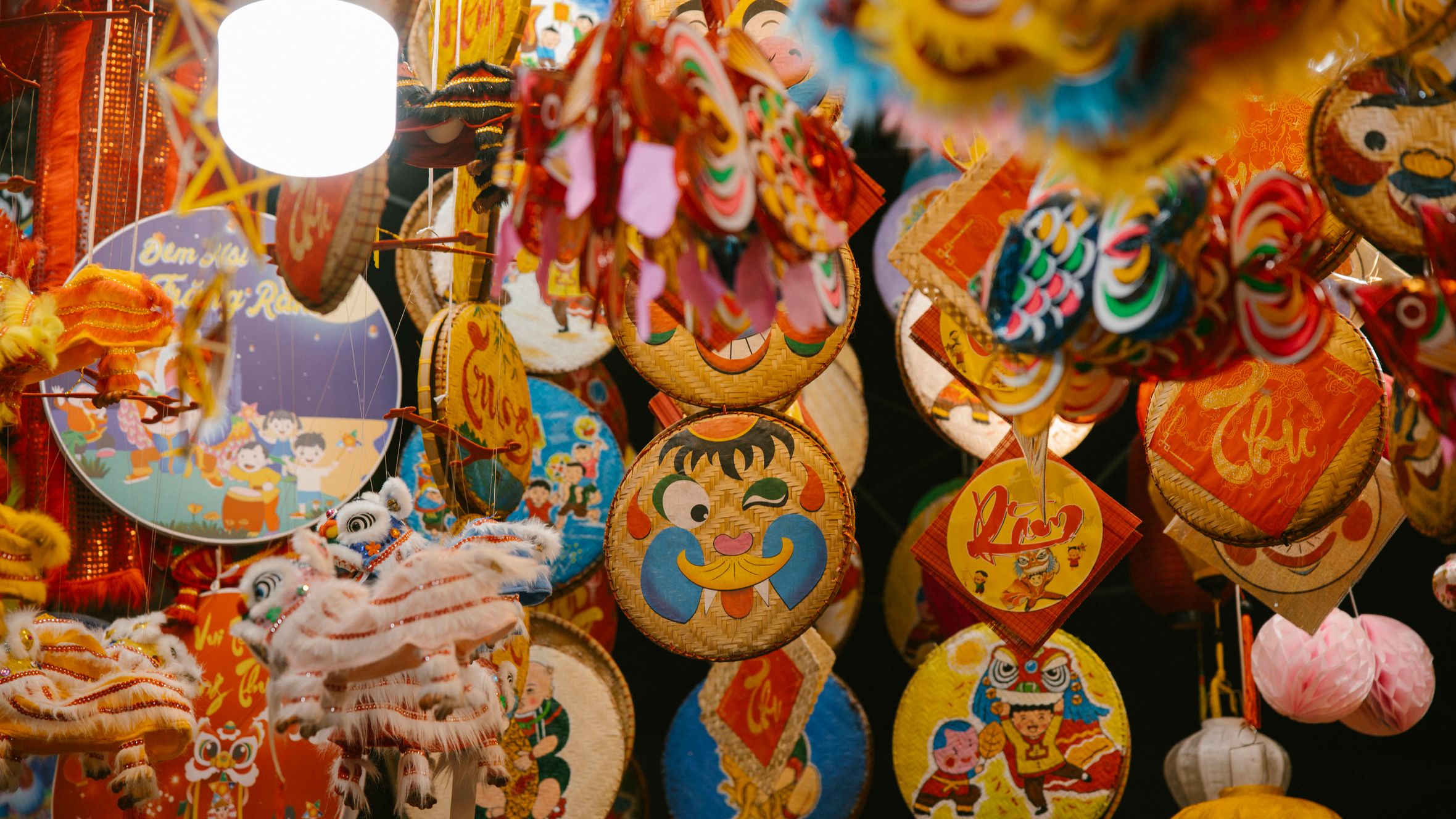 Vibrant lanterns and decorations for Vietnamese Mid-Autumn Festival celebration at night.