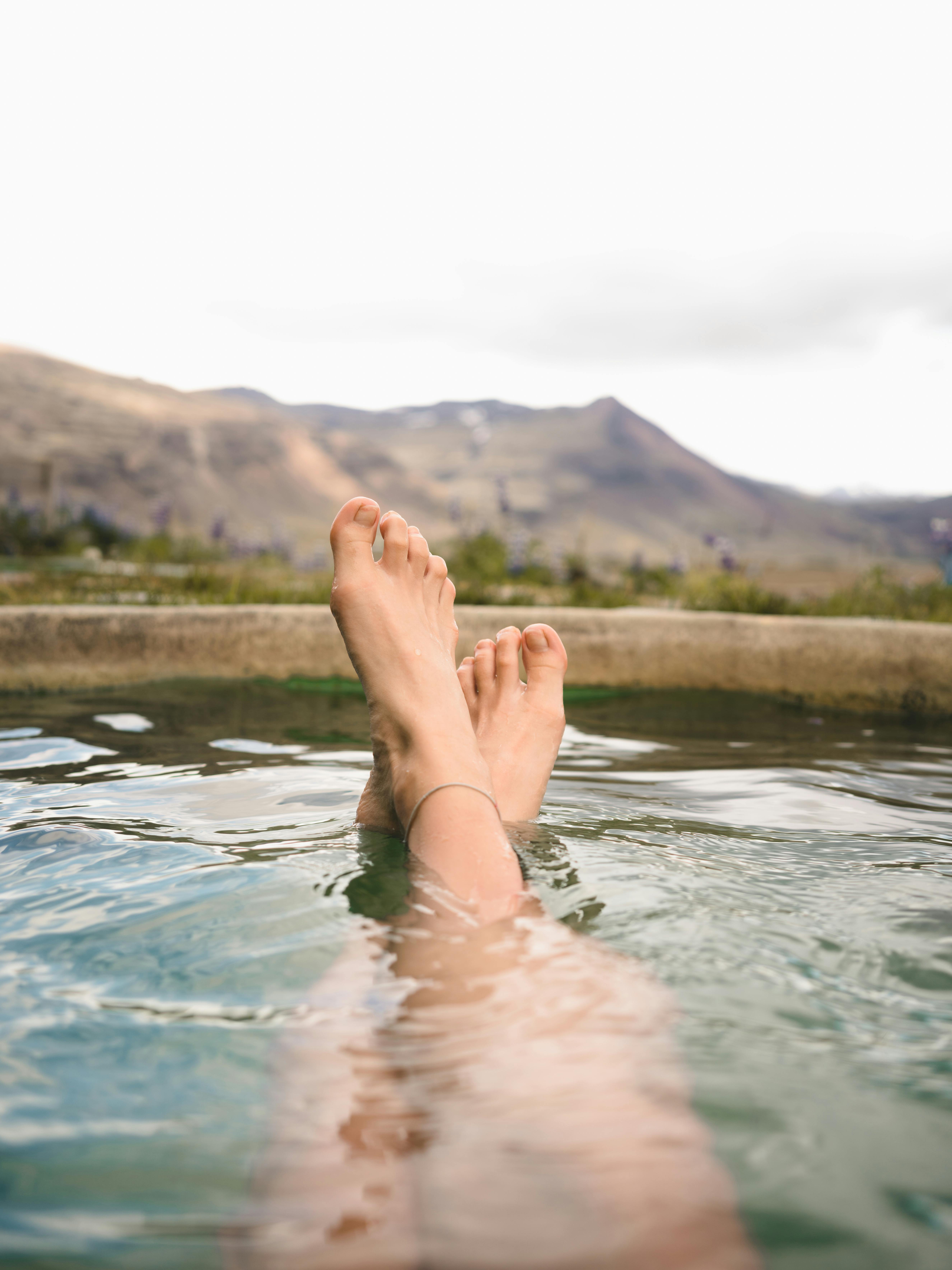 photo of person s feet during daytime