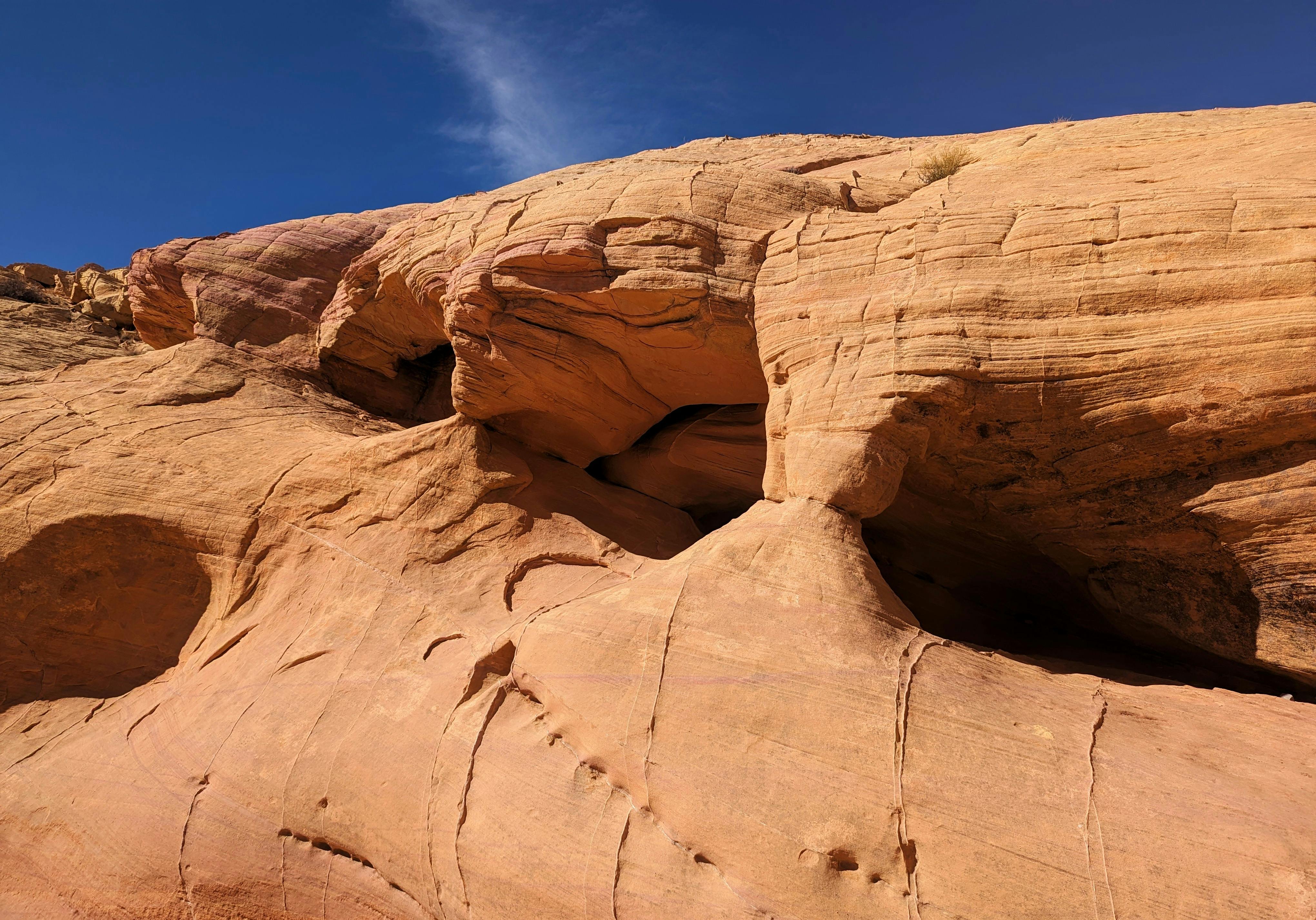 a rock formation with a hole in it