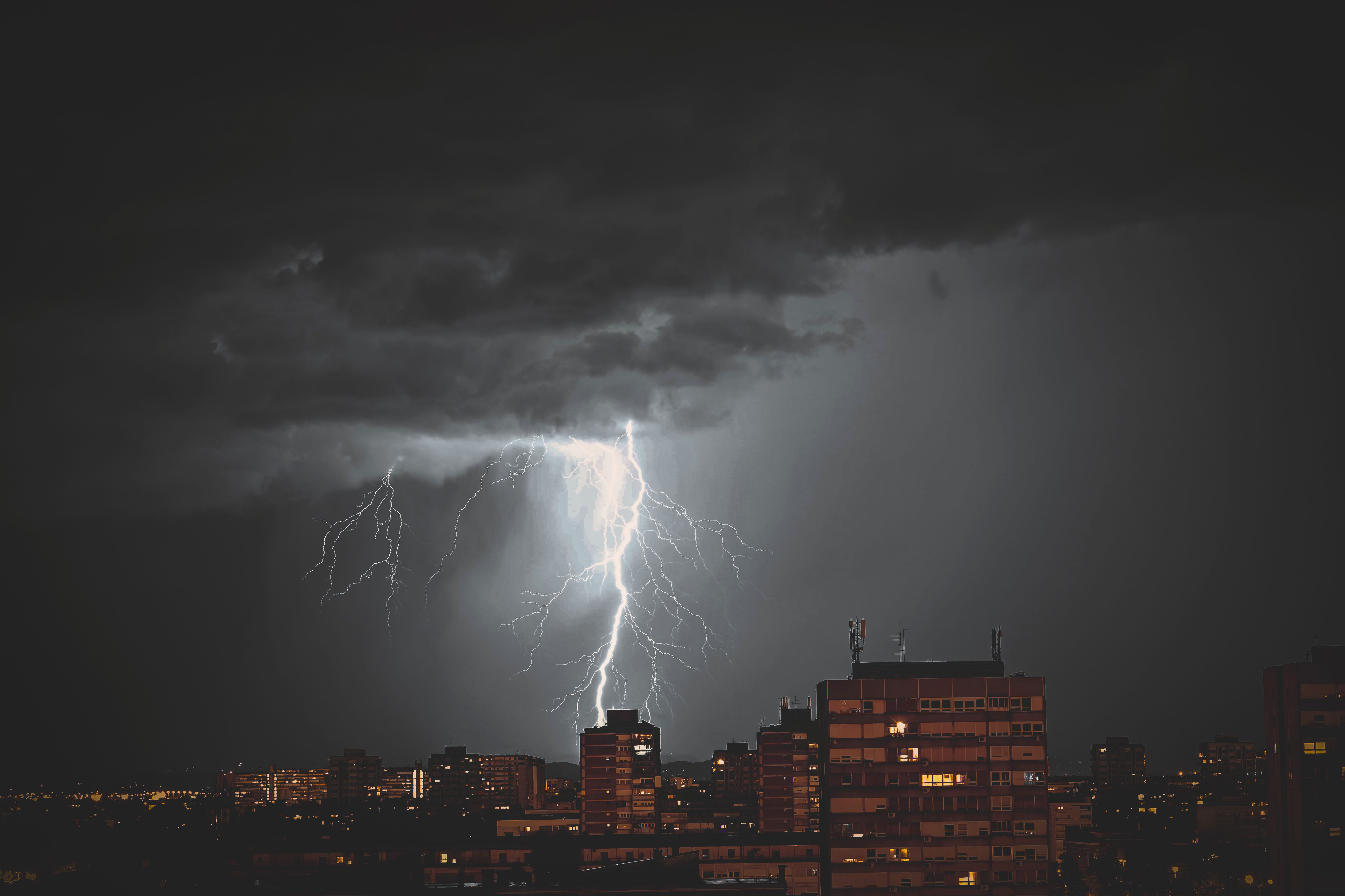 Stunning night view of a lightning storm illuminating the skyline of Zagreb, Croatia.