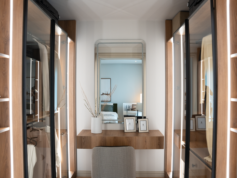 Elegant minimalist vanity and mirror reflecting a cozy bedroom
