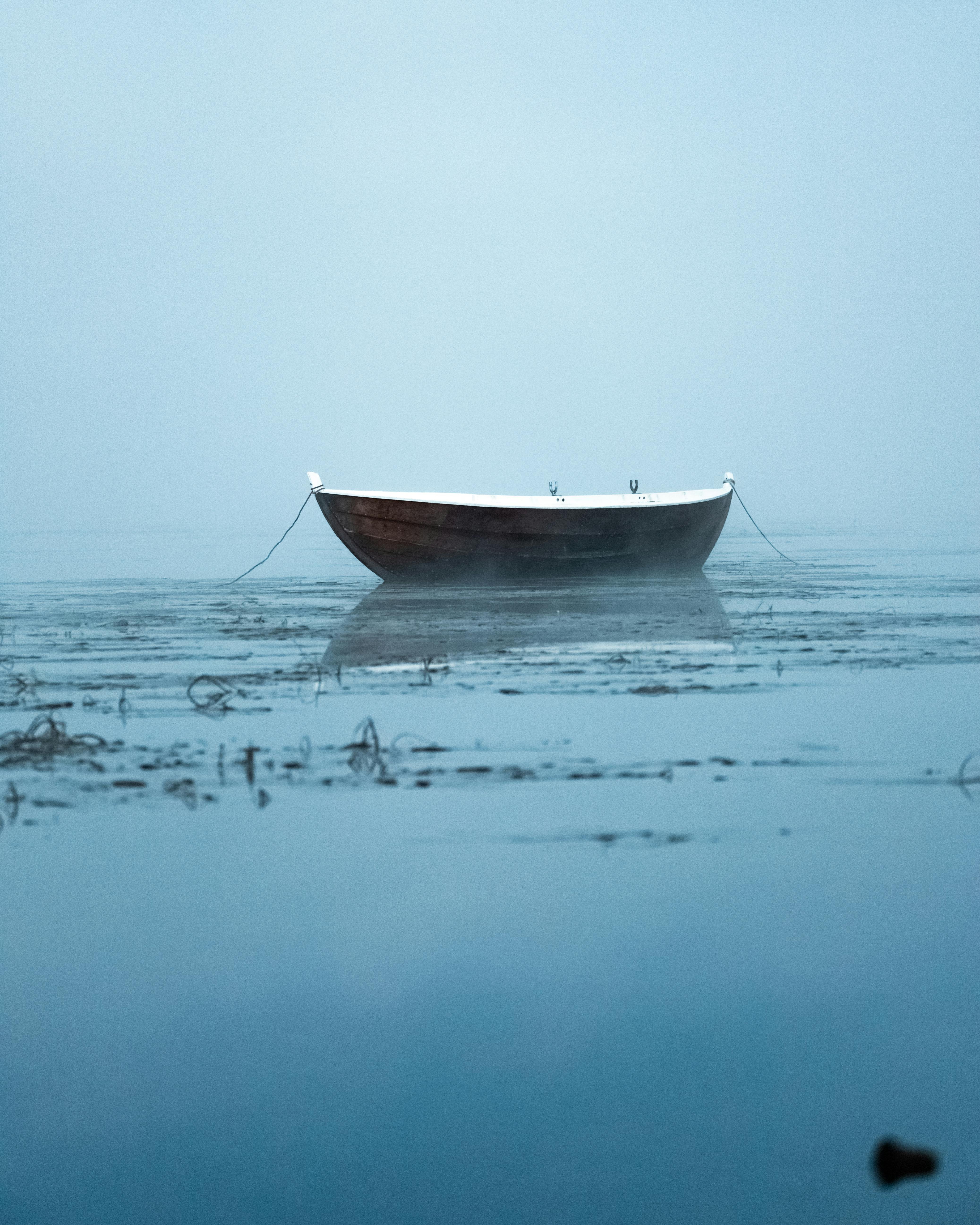 Boat Anchored on Water · Free Stock Photo