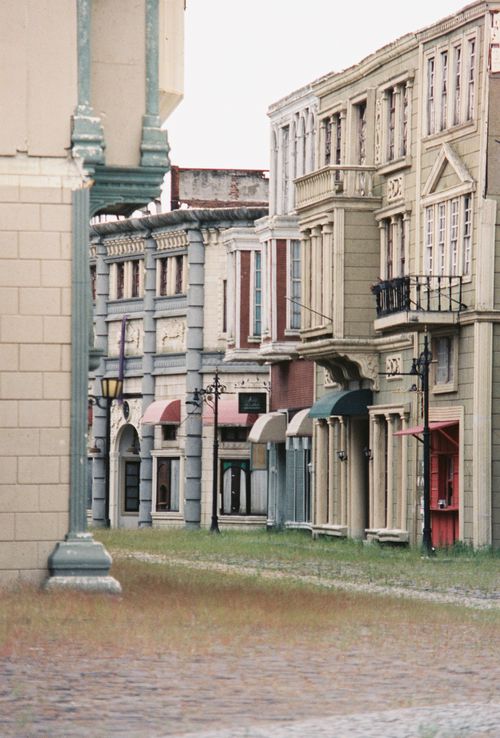 Free Elegant Victorian street facade showcasing historic architectural styles. Stock Photo