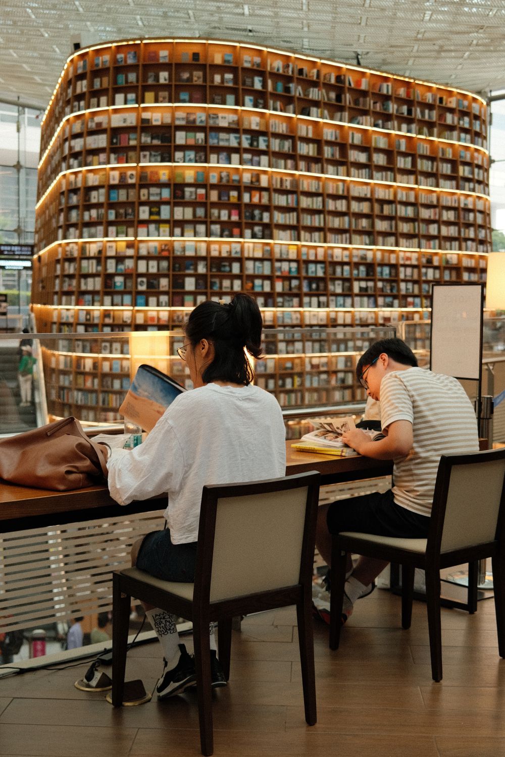 Startield Library Starfield Library in Seoul with Visitors Reading · Free Stock Photo