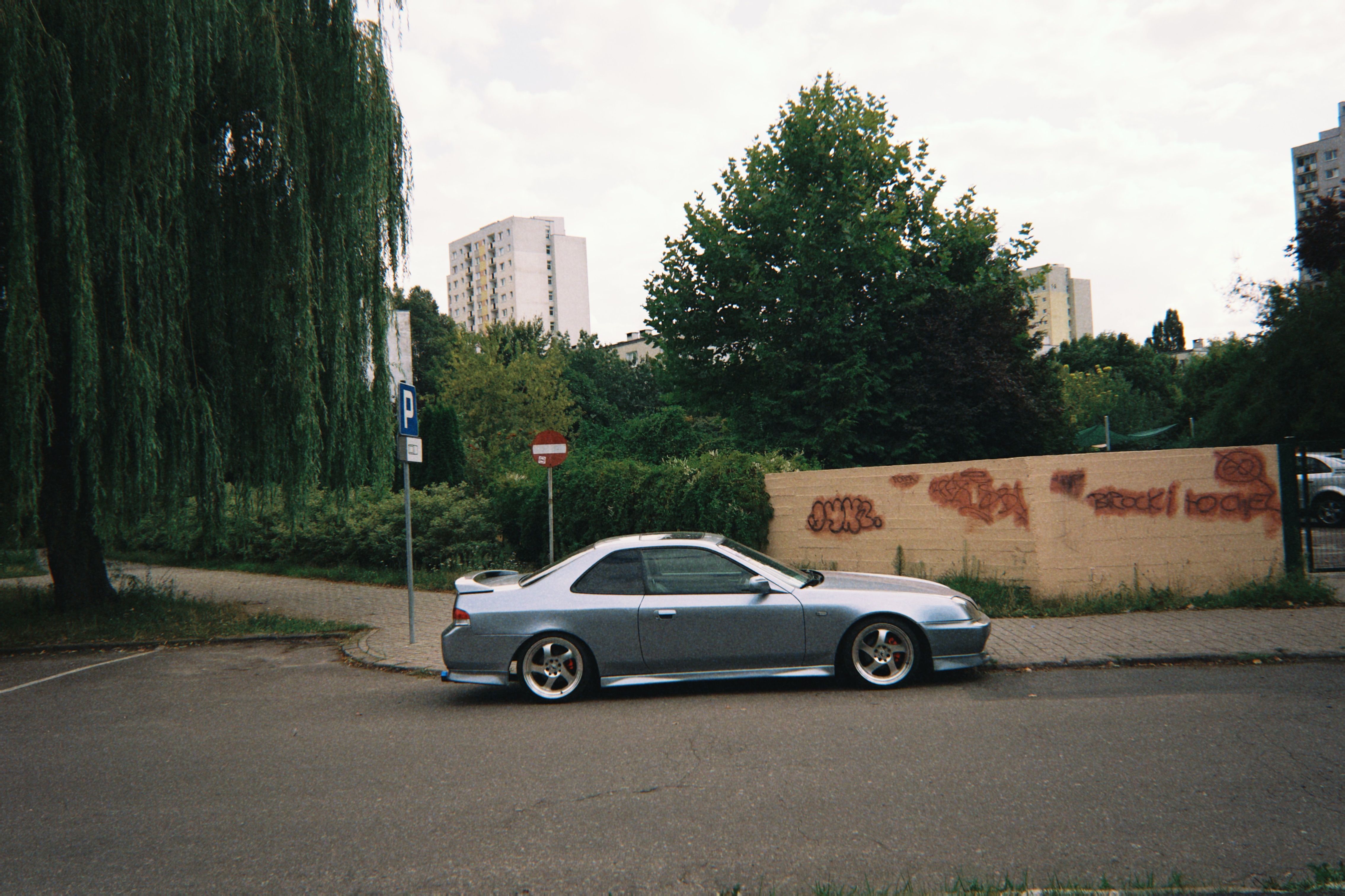 A car parked on the side of the road · Free Stock Photo