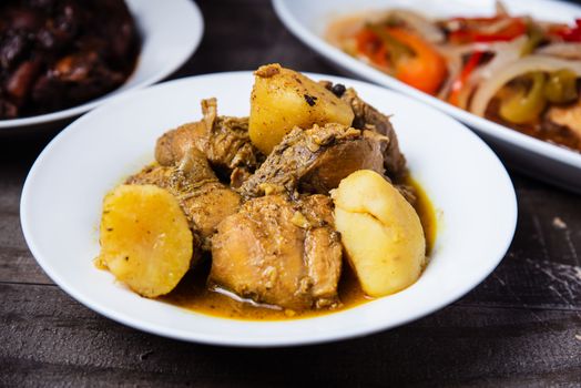 Delicious Caribbean chicken stew with potatoes, perfect for dinner or lunch.