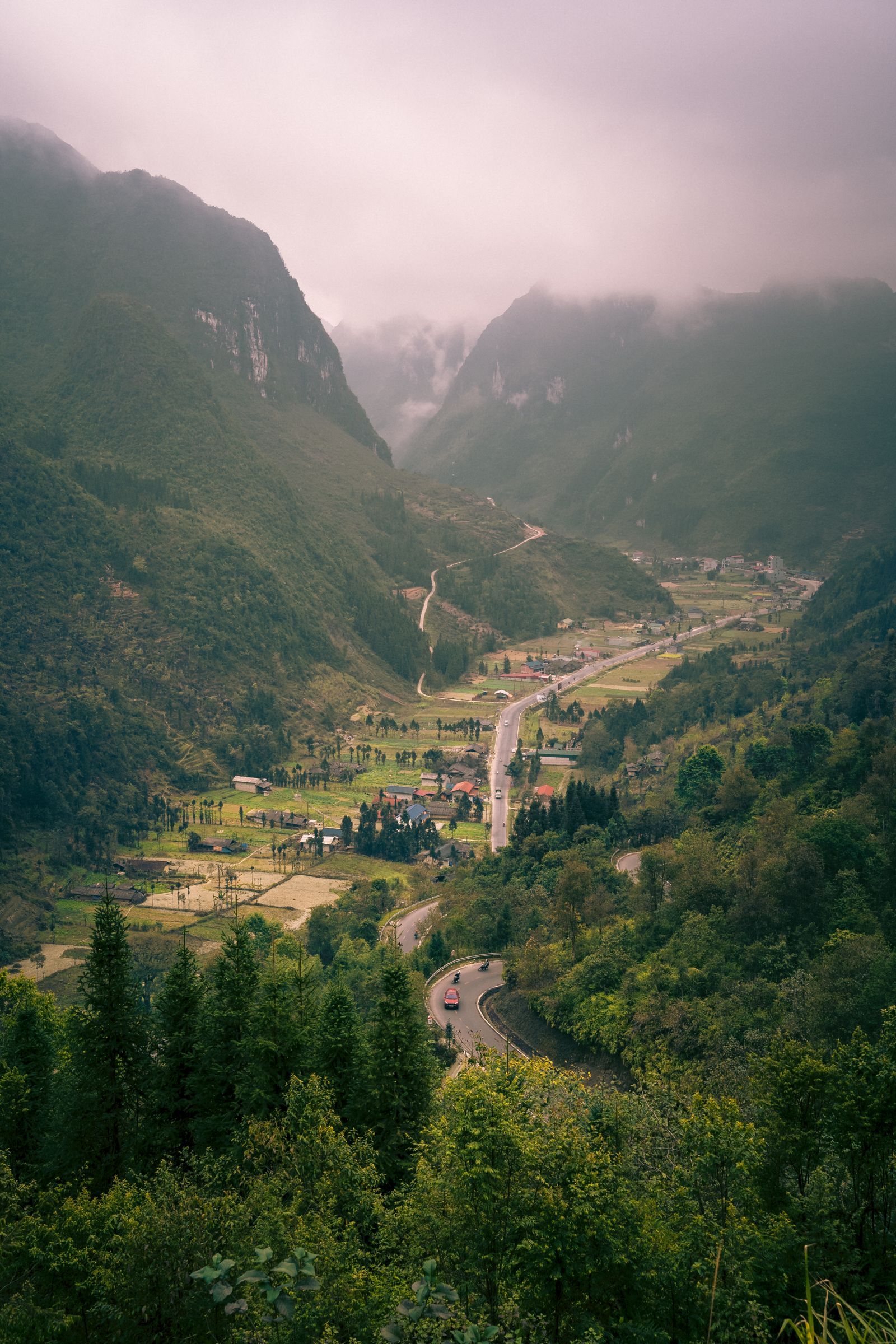 Misty Ha Giang mountain landscape showing changing road and weather conditions