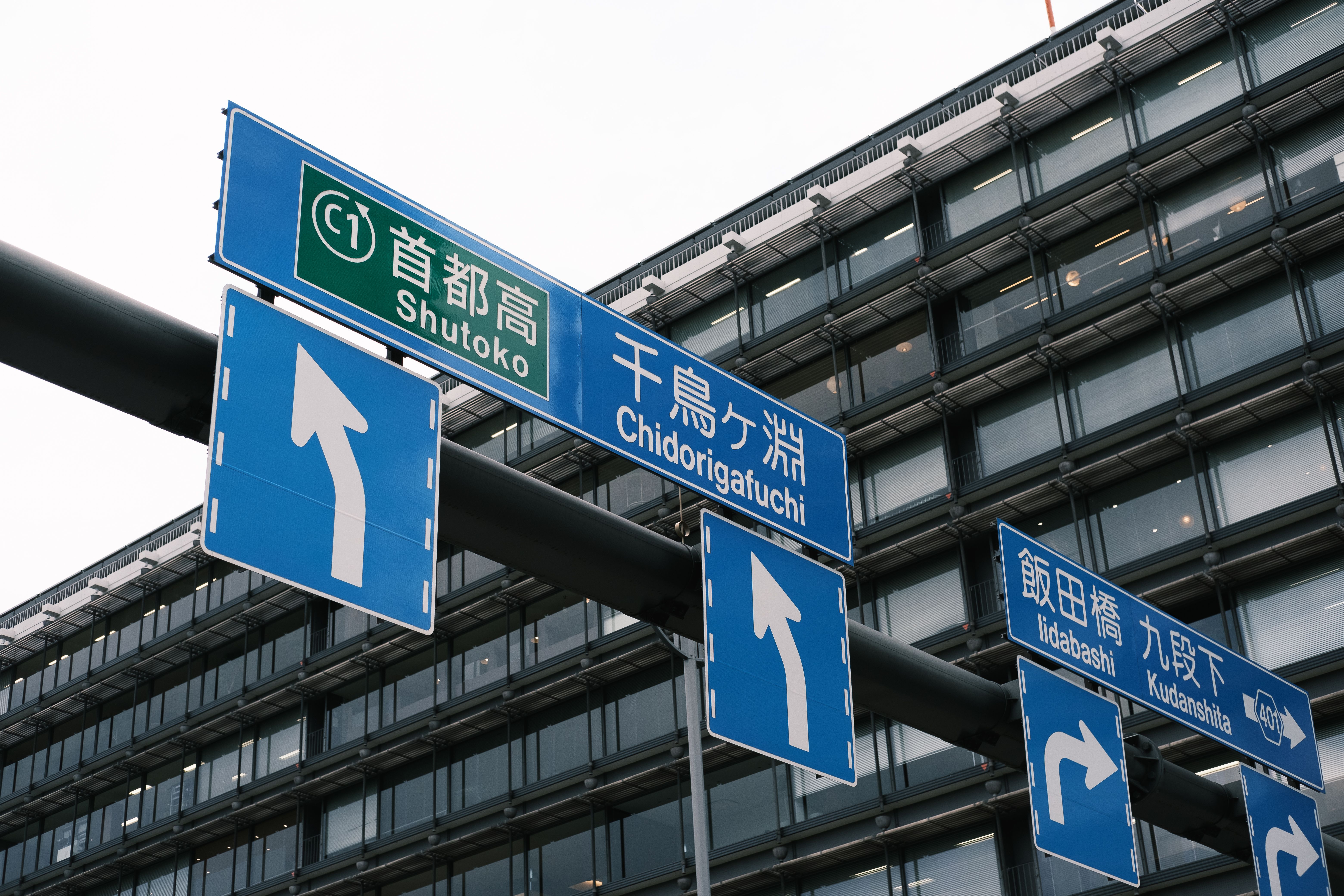 A street sign with arrows pointing to different directions · Free Stock ...