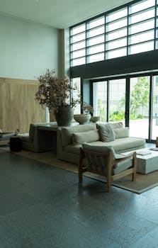 Spacious living room with contemporary design and large windows in Ciudad de México.