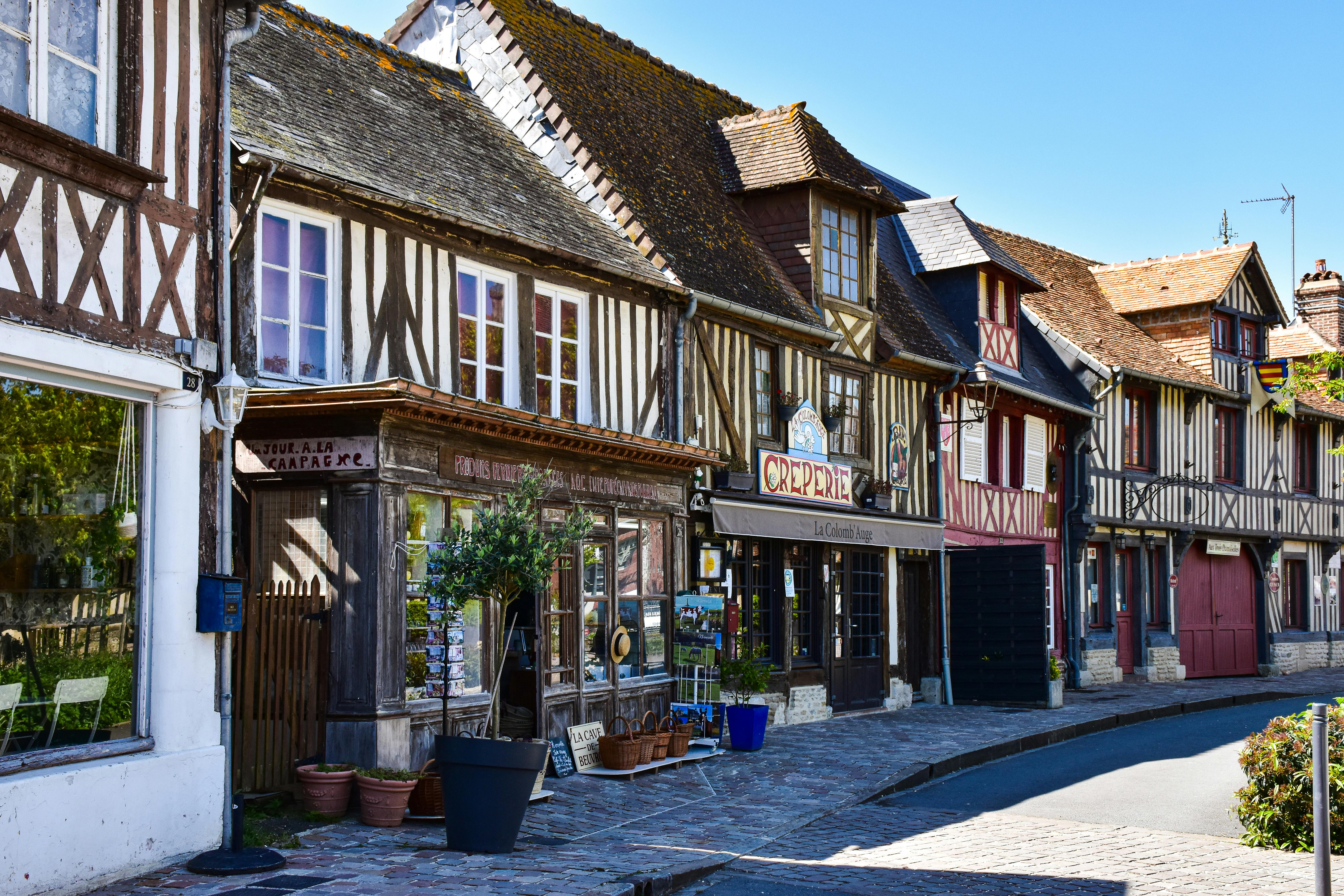 Quimper scenery with half-timbered houses and cathedral spires under a summer sky