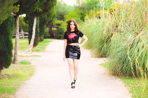 Free stock photo of female walking, high heels, latex skirt