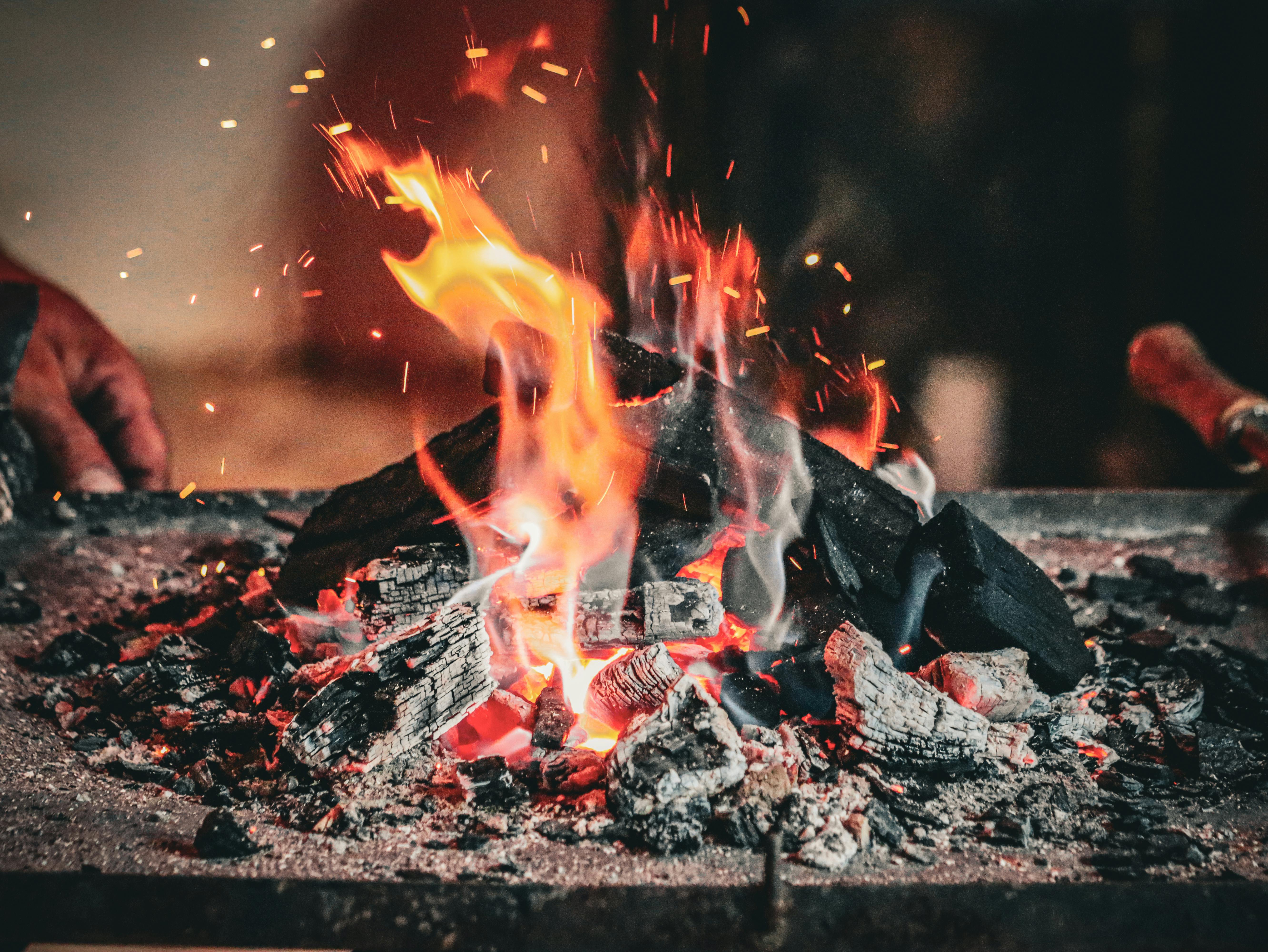 a fire is burning in a blacksmith s shop