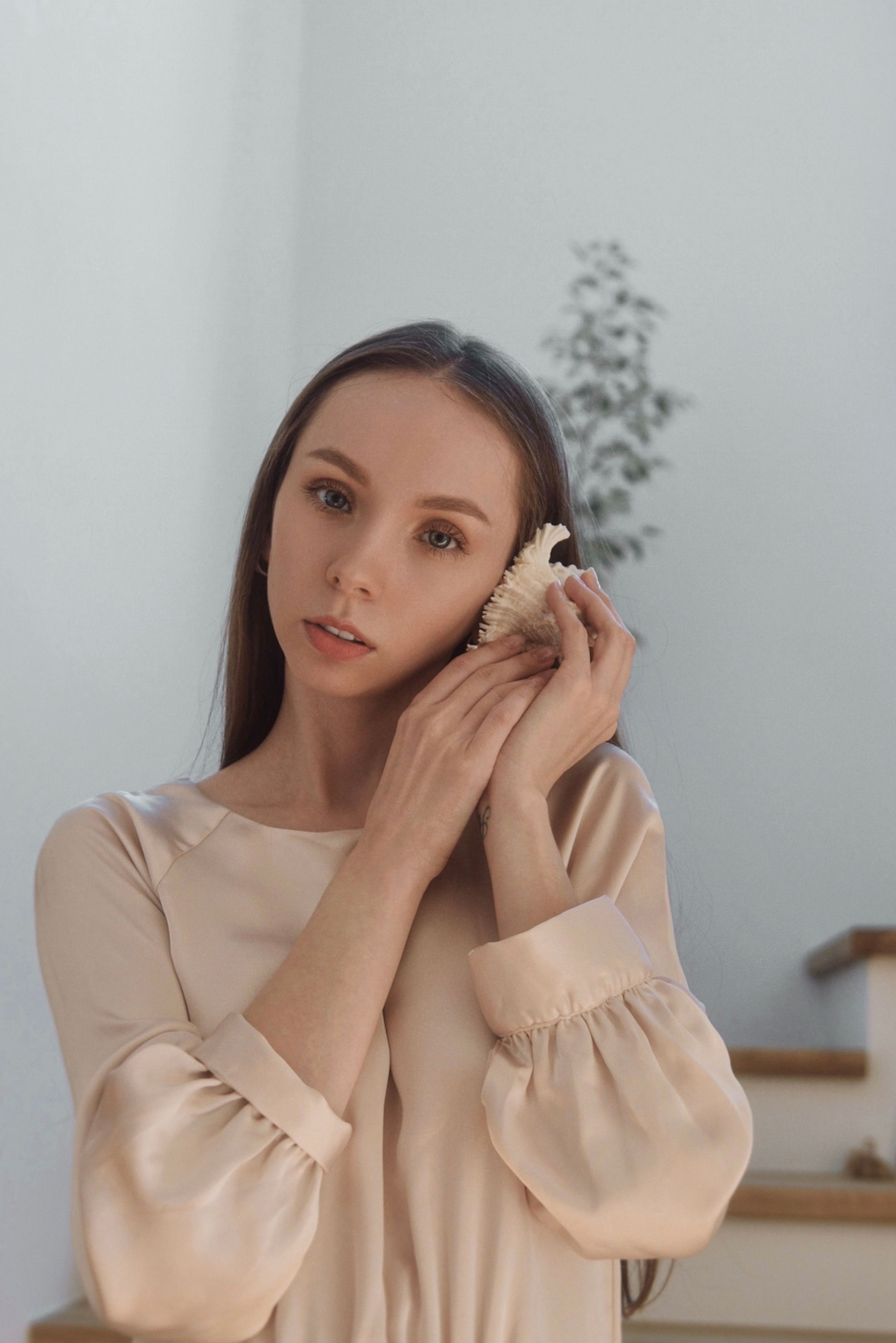 Portrait of Woman Holding Shell · Free Stock Photo