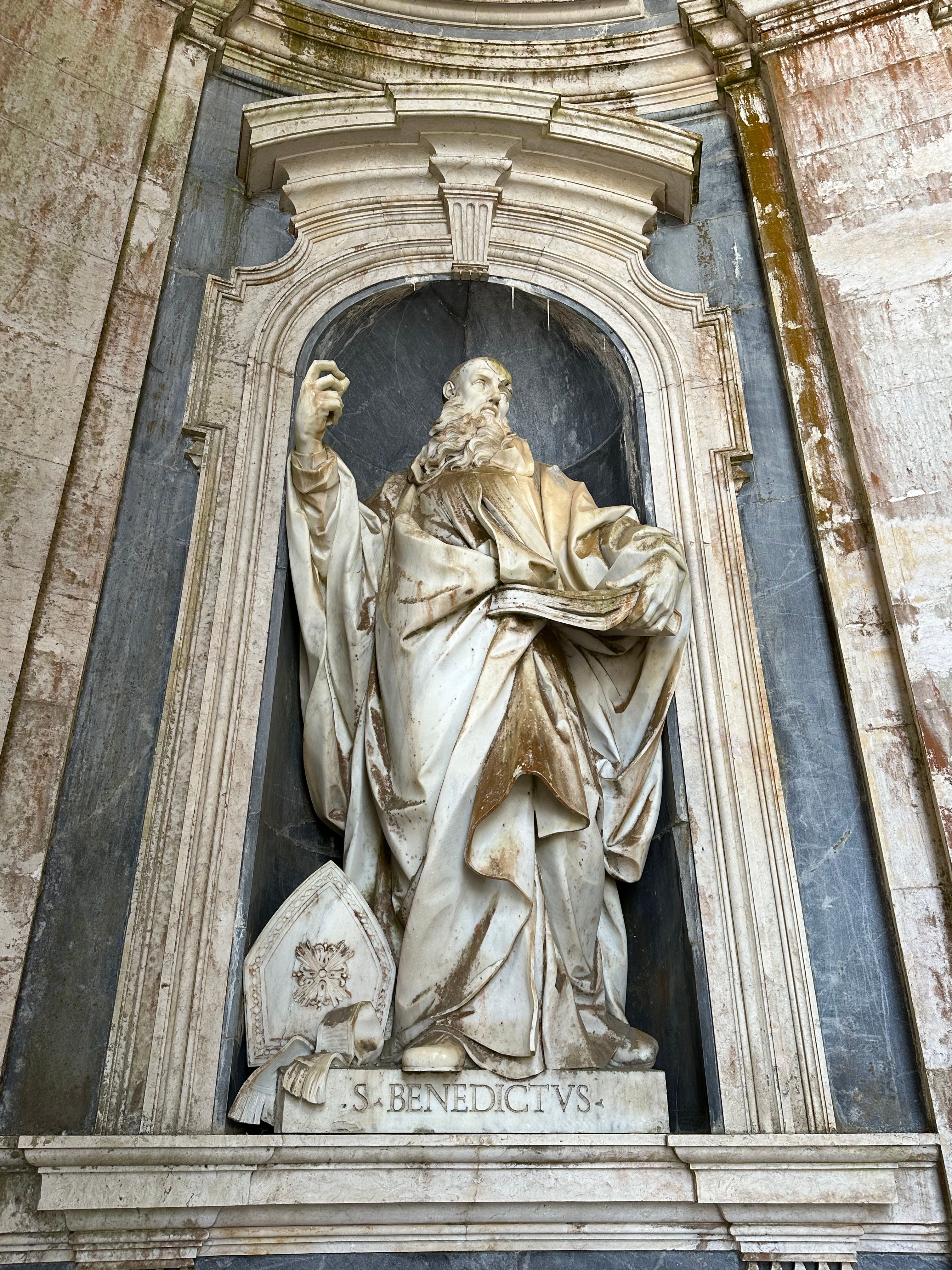 Intricately carved statue of Saint Benedict in Mafra National Palace.