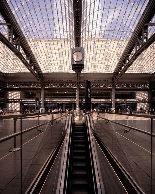 Free Explore the futuristic design of Moynihan Train Hall in New York City, showcasing urban elegance and efficient transportation. Stock Photo
