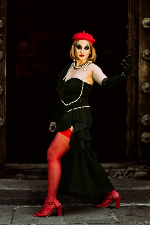 A woman in red stockings and a black dress · Free Stock Photo