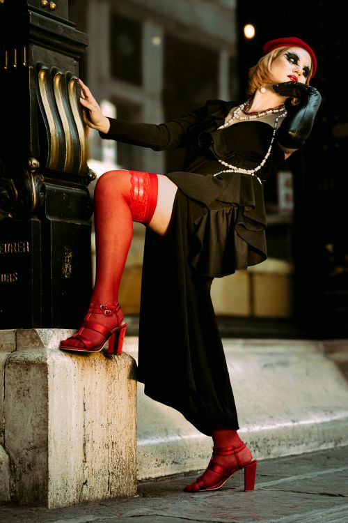 A woman in red stockings and a black dress Free Stock Photo A woman in red stockings and a black dress Free Stock Photo