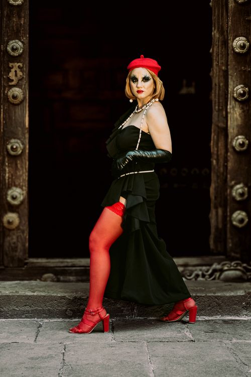 A woman in red stockings and a black dress Free Stock Photo A woman in red stockings and a black dress Free Stock Photo