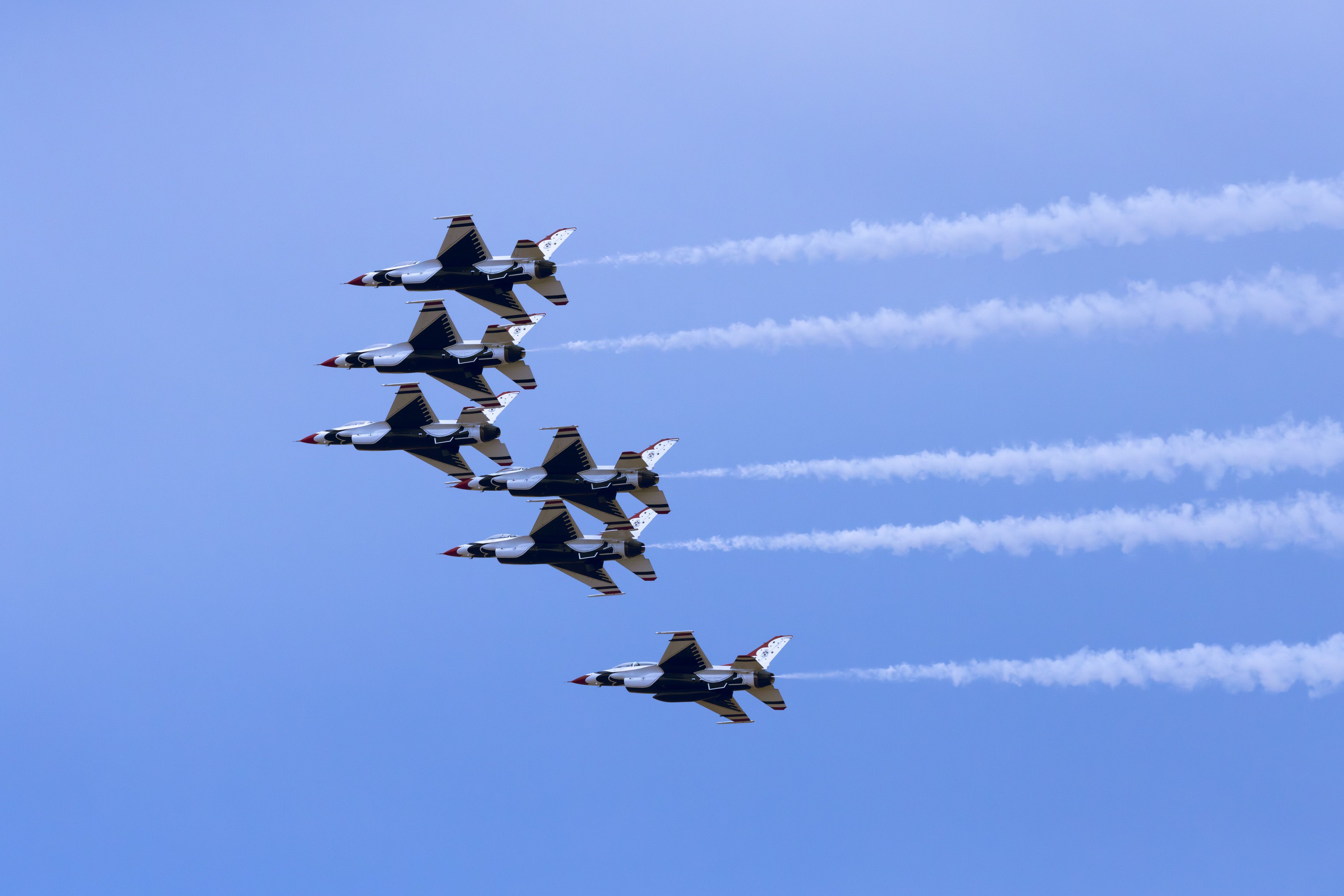 A group of jets flying in formation · Free Stock Photo