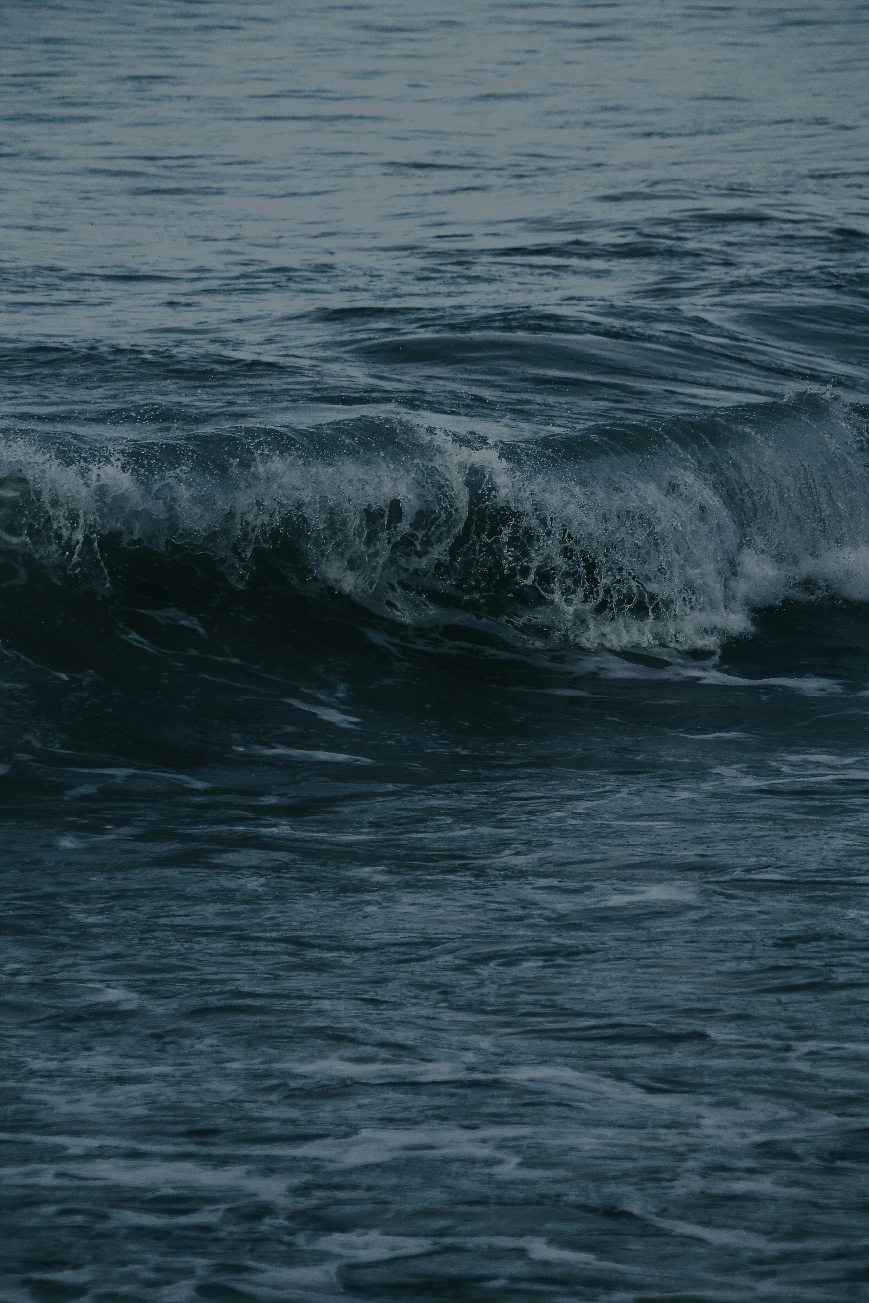 Dark ocean waves crashing near Tangier, Morocco, capturing natural motion and energy.