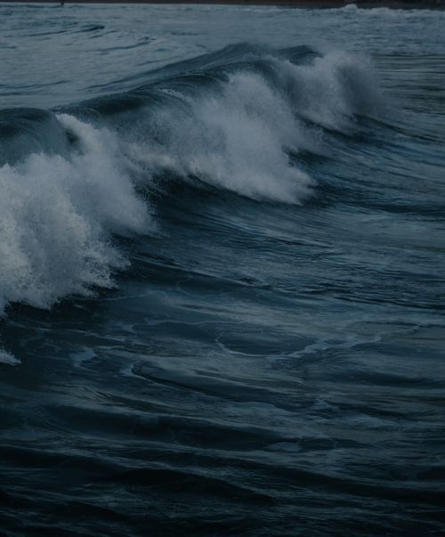 Free Powerful ocean waves crashing on the shore of Tangier, Morocco. Stock Photo