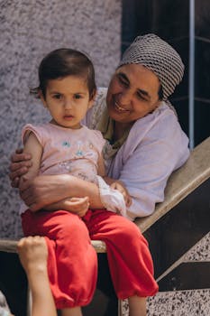 A loving family interaction in Kafr El-Shaikh, Egypt, capturing warmth and connection.
