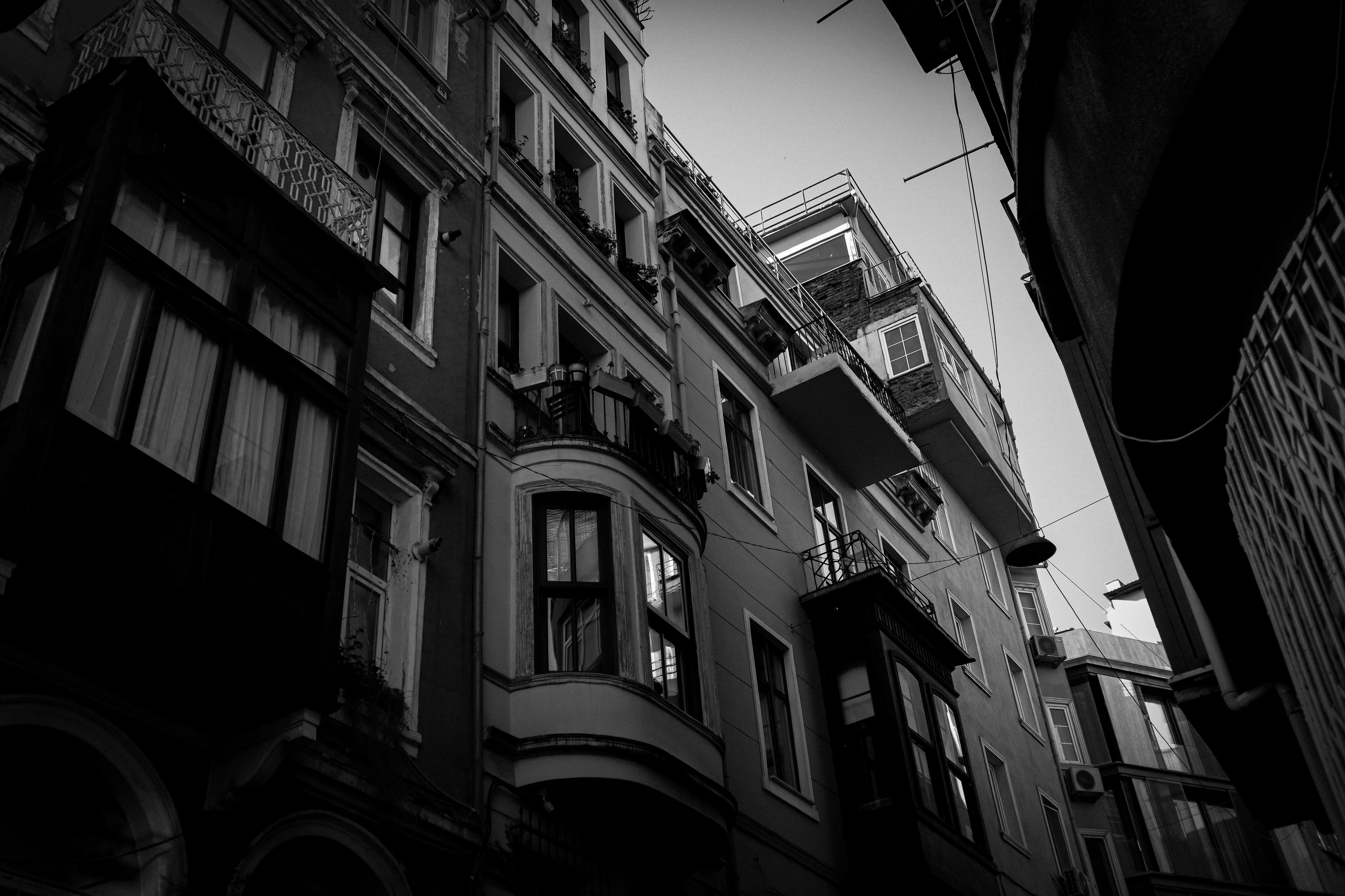 Explore intricate architectural details of a building in İstanbul, captured in striking monochrome.