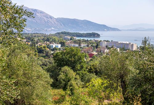 Free Discover scenic landscapes of Dassia, Corfu overlooking the Ionian Sea, perfect for summer exploration. Stock Photo