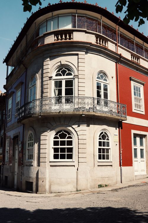 Free Elegant historic building with ornate architecture in Porto, Portugal, showcasing unique urban charm. Stock Photo
