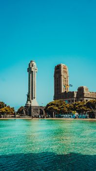 Stunning view of Plaza de España in Santa Cruz de Tenerife, featuring historical architecture and a vibrant pool.