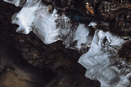 Free Detailed shot of frosted ice formations showcasing intricate texture in a natural environment. Stock Photo