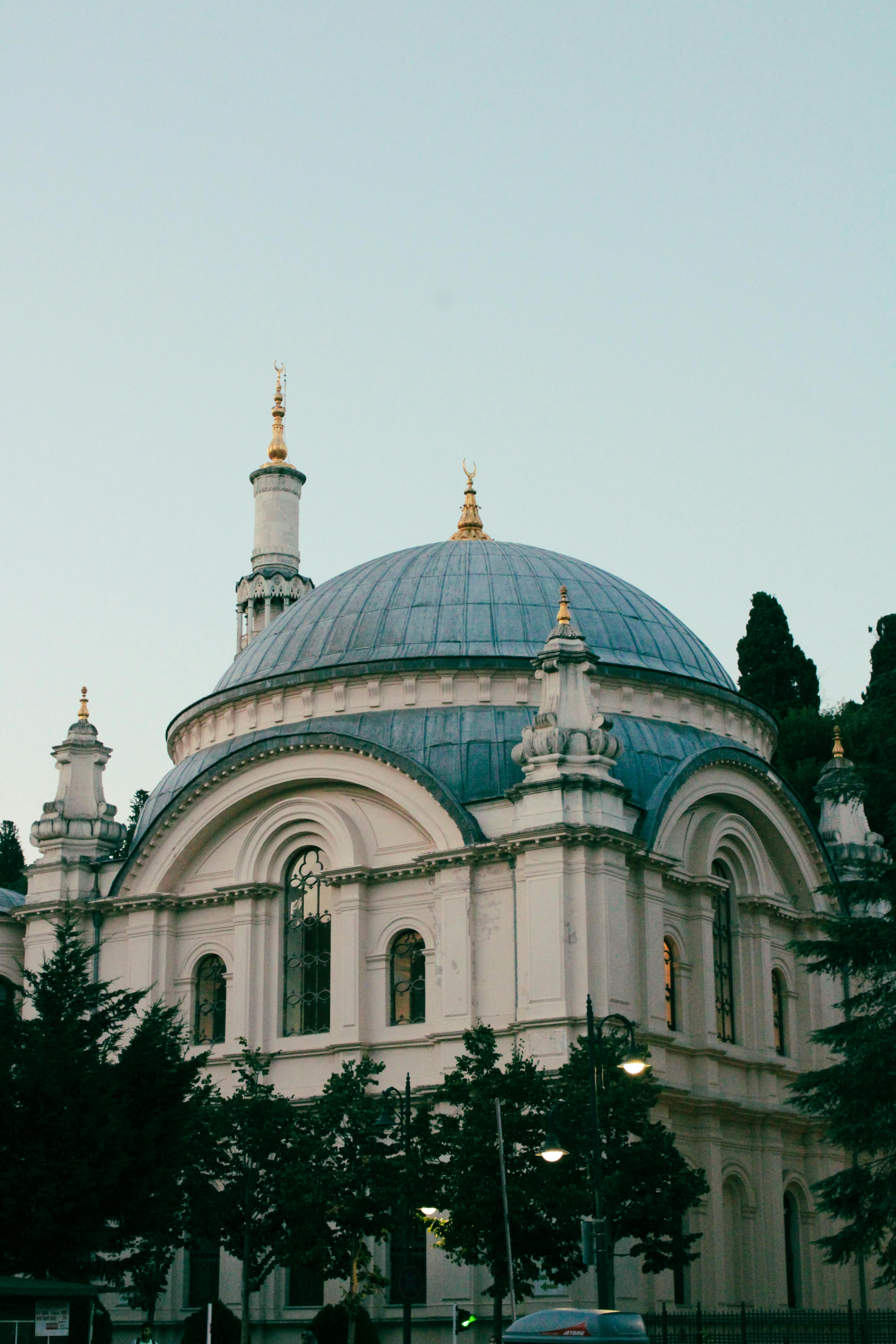 a white building with a dome on top