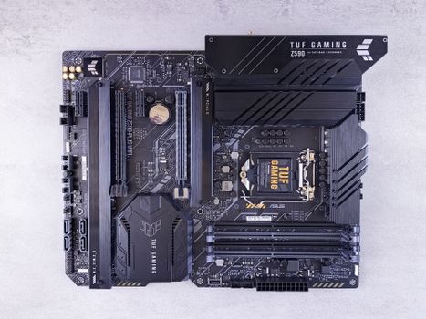 High-quality image of ASUS TUF Gaming Z590 motherboard showcasing intricate electronic details.