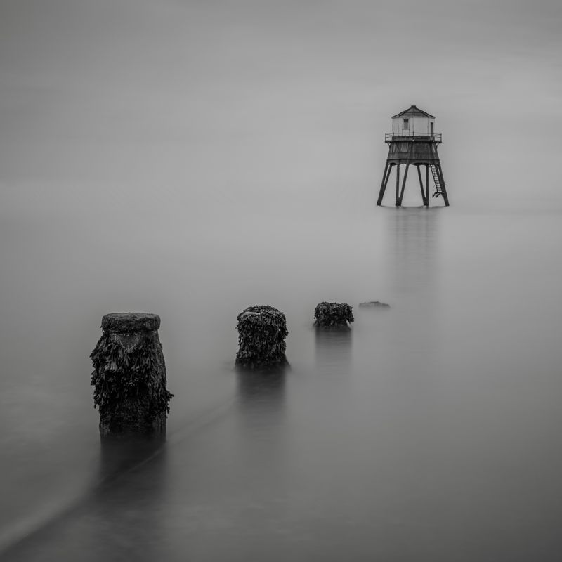 Chalk & Compass cover art — lighthouse in fog by simon phillips on Pexels