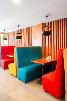 Vibrant seating and contemporary design highlight this modern restaurant interior.
