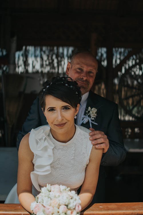 Newlyweds Togther with Flowers